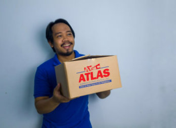 delivery man holding a box